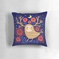 A decorative pillow featuring a mystical owl surrounded by flowers, stars, and a crescent moon against a dark background.