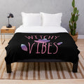 Soft and cozy plush blanket with witchy vibes for a boho, spiritual home