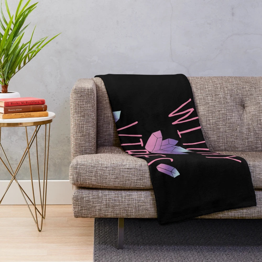 Soft and cozy plush blanket with witchy vibes for a boho, spiritual home