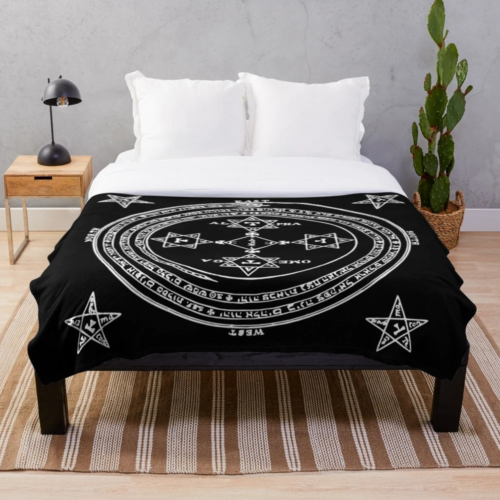 Plush blanket with occult summoning circle design
