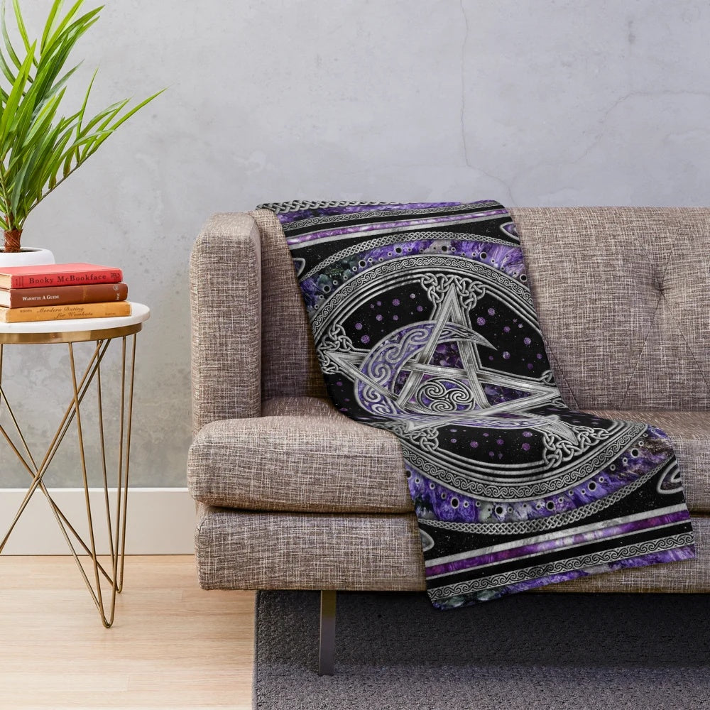 Purple plush blanket featuring sacred symbols like pentagram, triskelion, and triple moon