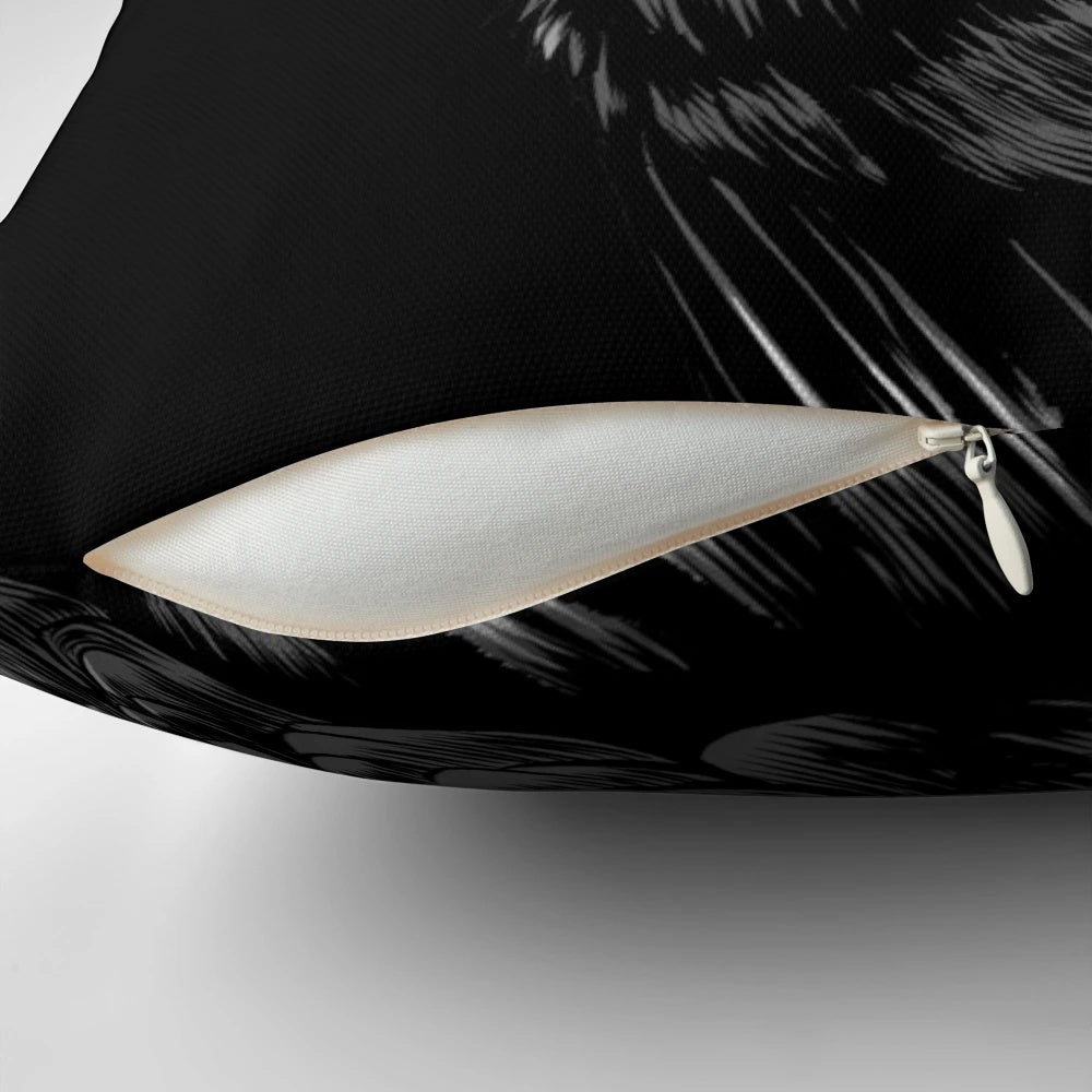A black and white raven pillow with intricate feather details, perfect for gothic and spiritual decor.