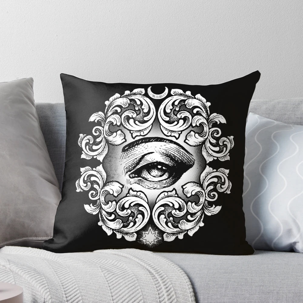 A decorative pillow featuring a detailed third eye design, perfect for adding a touch of mysticism to your home.