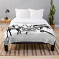 Plush blanket depicting the Celtic god Cernunnos and forest animals from the Gundestrup Cauldron