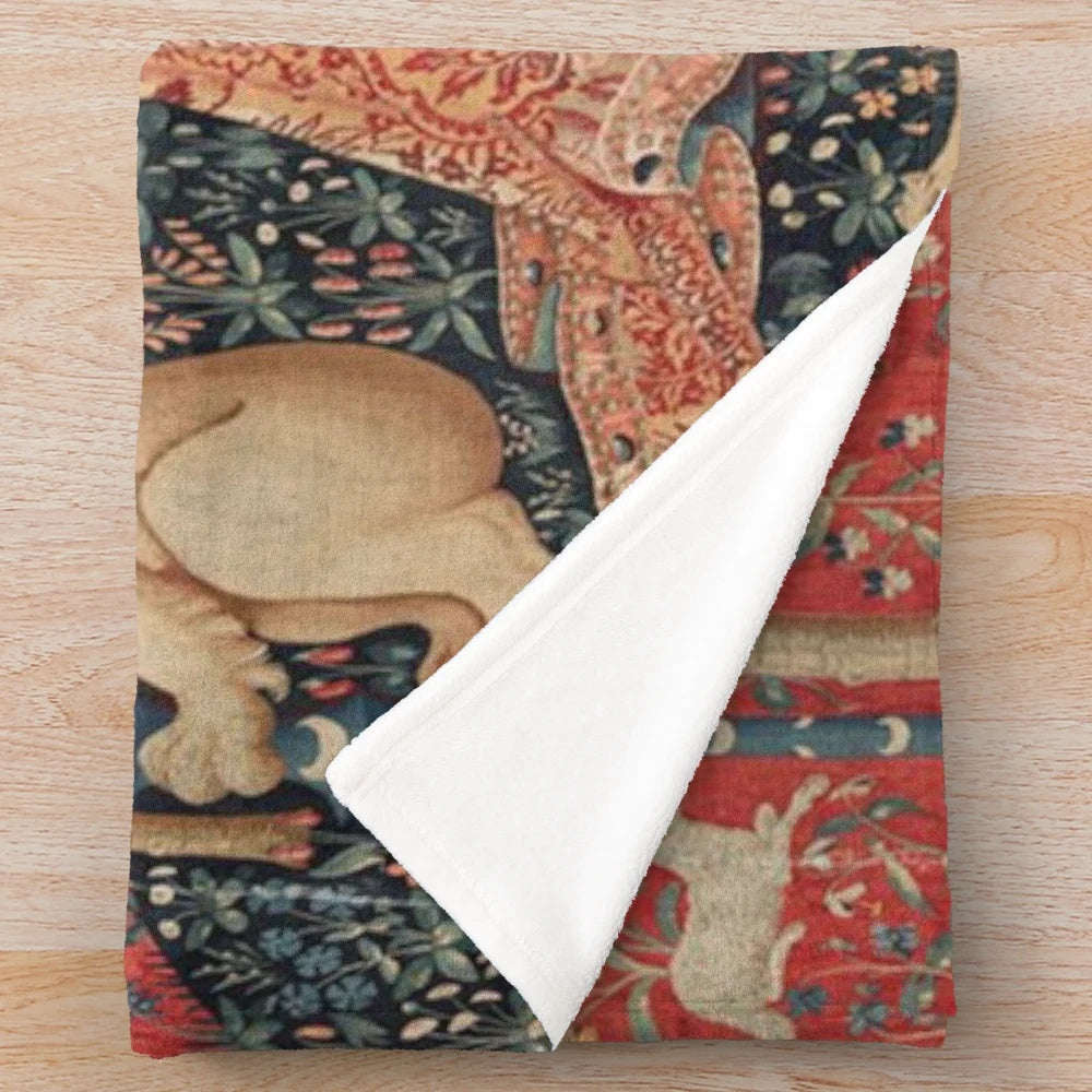 Plush blanket featuring a mythical unicorn in a medieval-style floral tapestry design