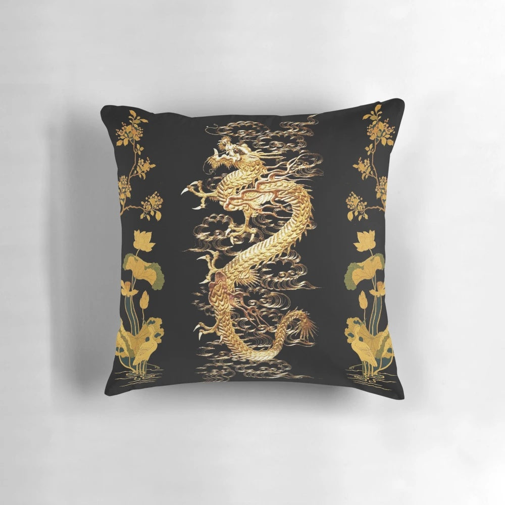 Gold dragon design on a black pillow with lotus flowers and an egret bird, showcasing a nature-inspired, zen-like aesthetic.