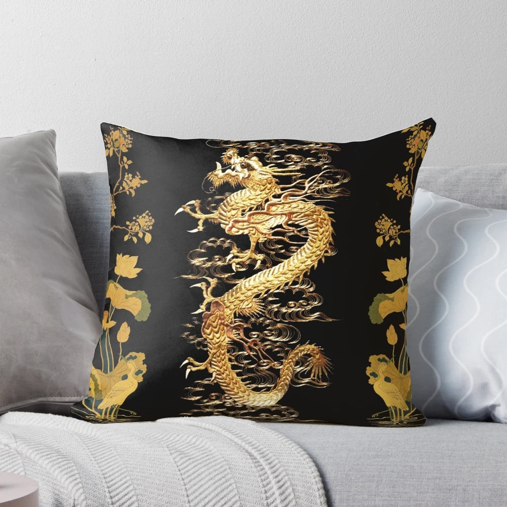 Gold dragon design on a black pillow with lotus flowers and an egret bird, showcasing a nature-inspired, zen-like aesthetic.