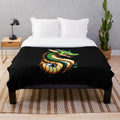 Anime-style illustration of a dragon on a plush blanket