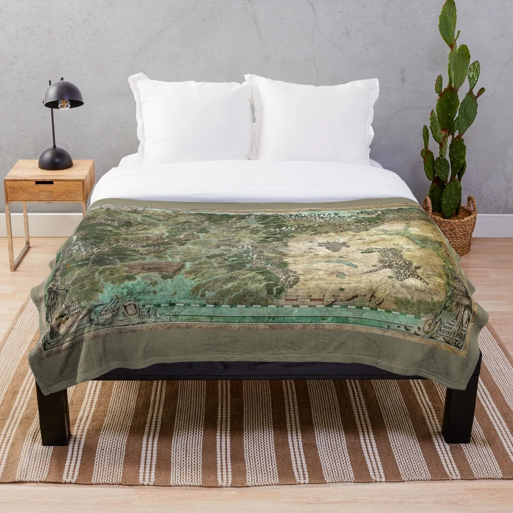 Plush blanket featuring a dragon design inspired by the Glorantha fantasy setting