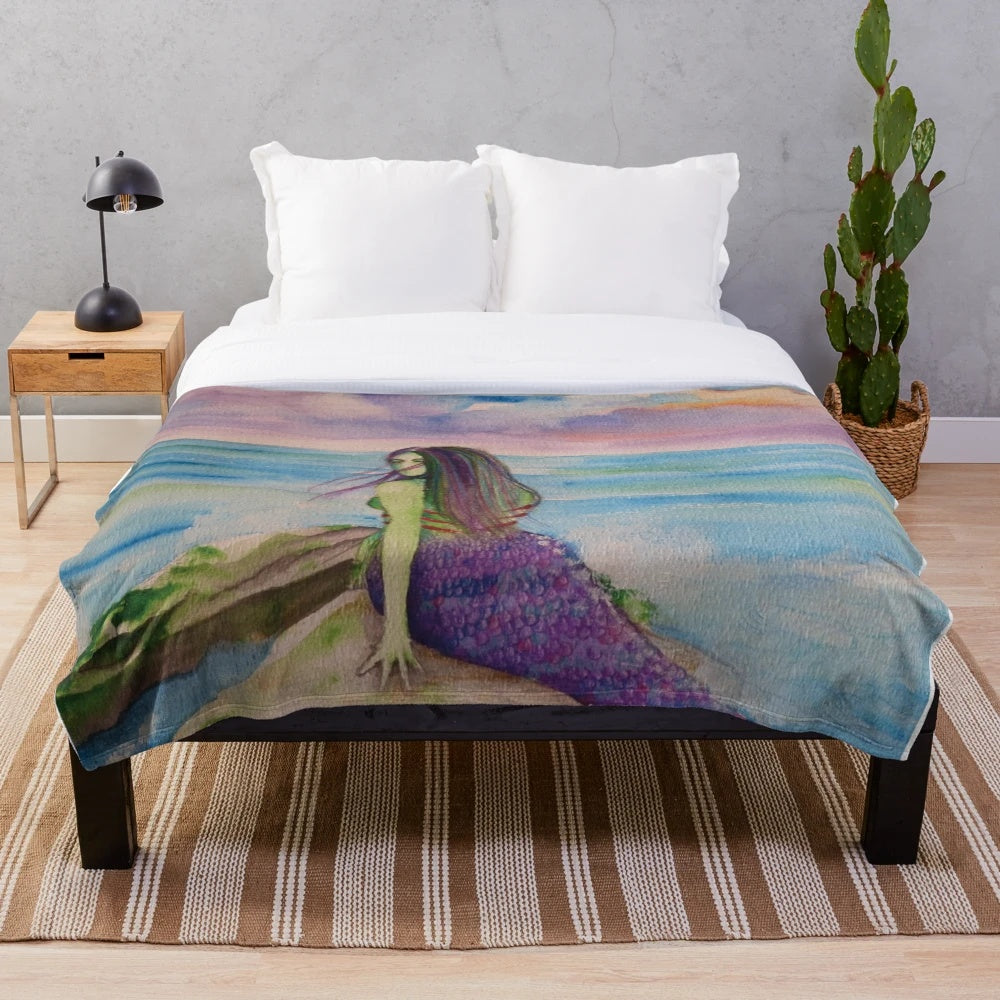 Siren sunset plush blanket featuring a mythical creature design