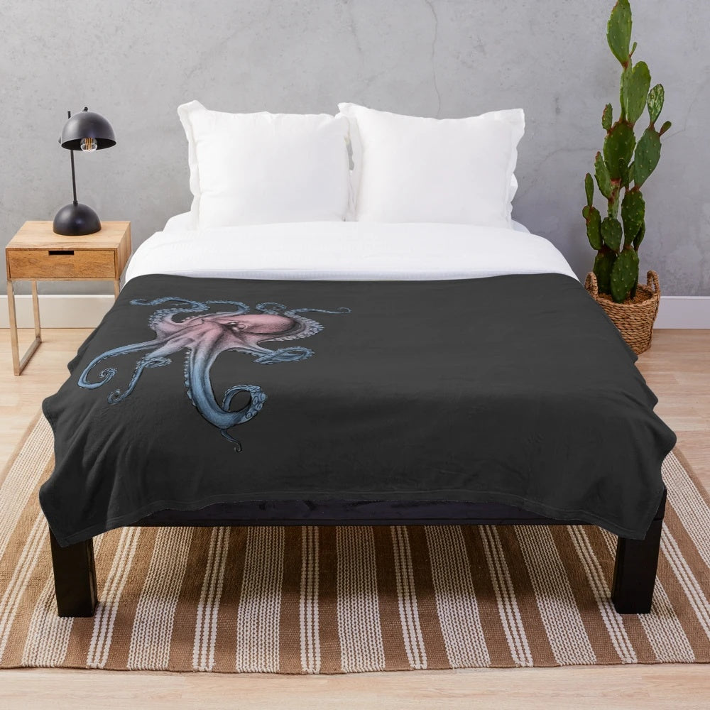 Plush blanket featuring a whimsical tentacles and sea creature design