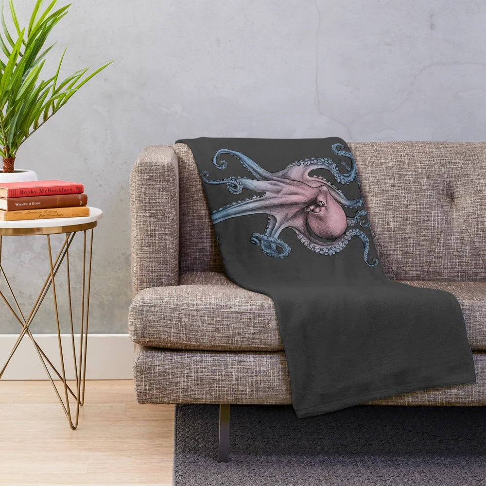 Plush blanket featuring a whimsical tentacles and sea creature design
