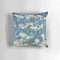 Quilted throw pillow with a beautiful impressionist-style painting of water lilies, inspired by the artwork of Claude Monet.