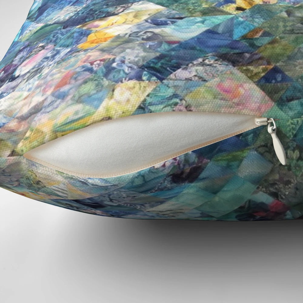 Quilted throw pillow with a beautiful impressionist-style painting of water lilies, inspired by the artwork of Claude Monet.