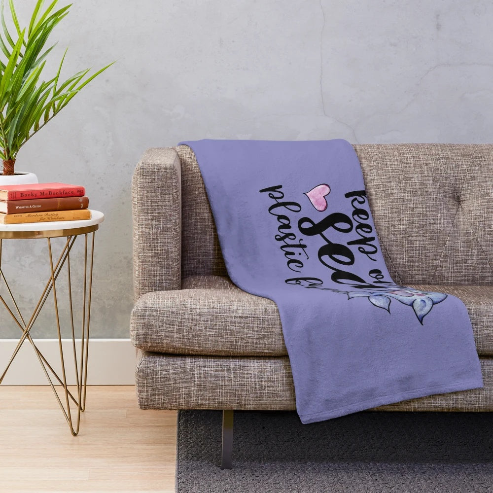 Narwhal plush blanket with a blue and white design