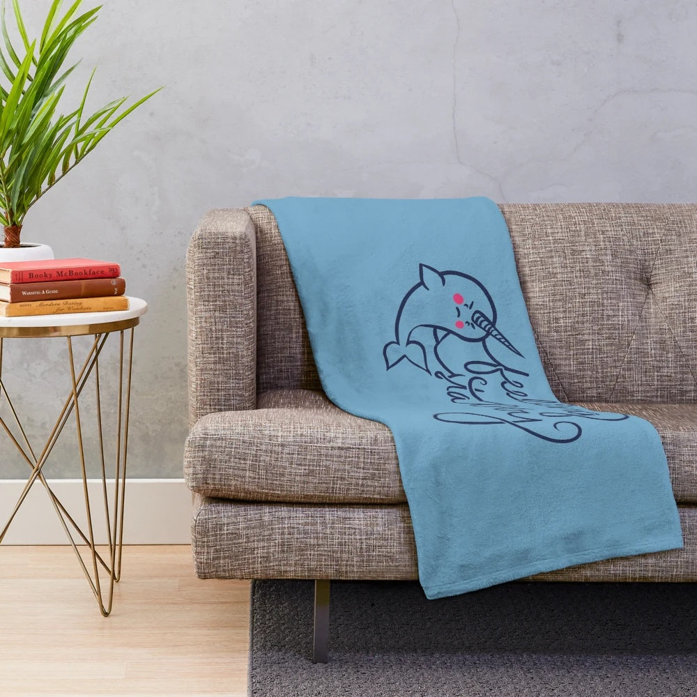 Narwhal plush blanket with a funny "feeling stabby" design