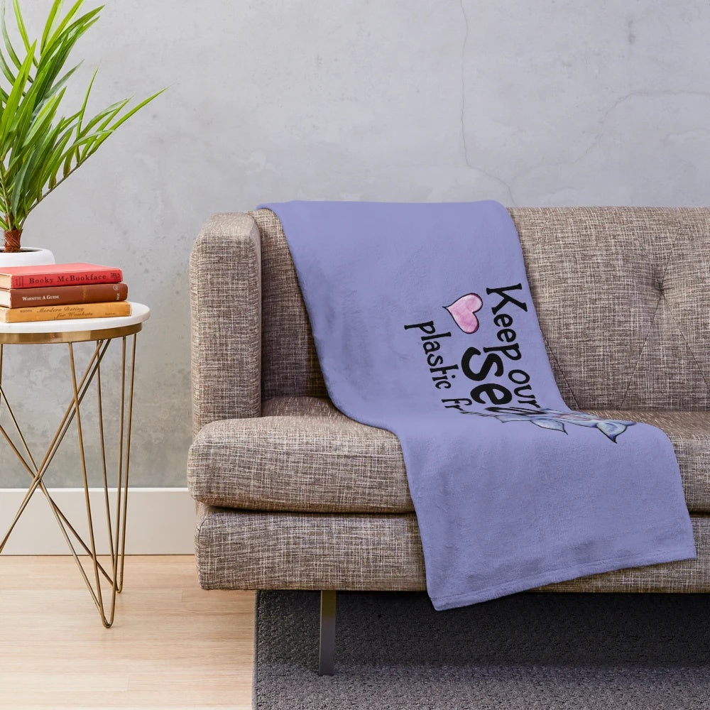 Cozy narwhal plush blanket with ocean conservation message