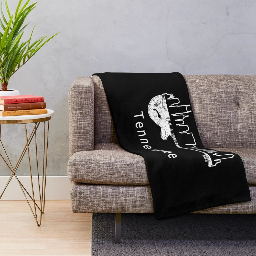 Plush blanket featuring a Nashville guitar and country music design