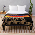 Soft and cozy brown bear plush blanket with native american-inspired design