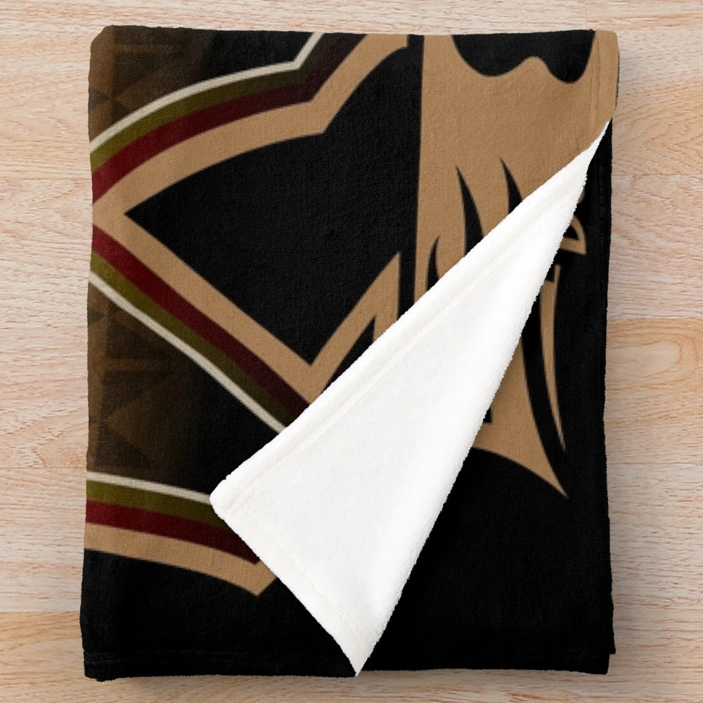 Soft and cozy brown bear plush blanket with native american-inspired design