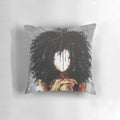 A beautiful, artistic throw pillow featuring a portrait of a regal, black woman with an afro hairstyle.