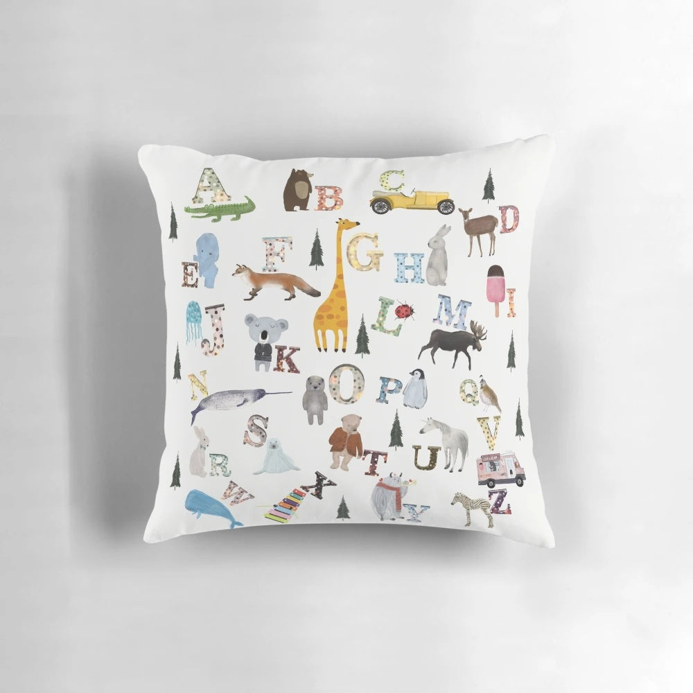Nature alphabet pillow with cute illustrations of woodland animals