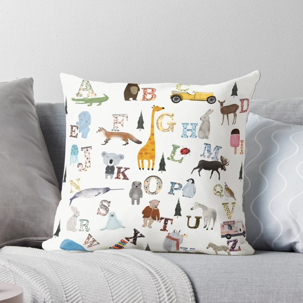 Nature alphabet pillow with cute illustrations of woodland animals