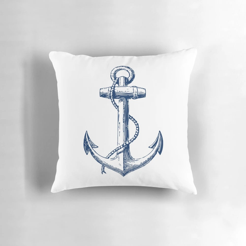 Nautical anchor decorative pillow featuring a blue and white design