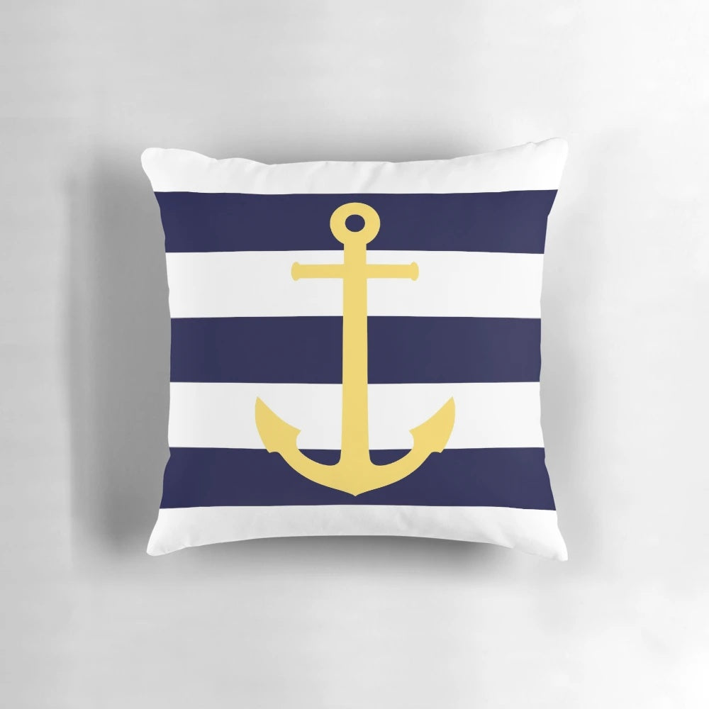 Nautical anchor-patterned pillow in mustard yellow and navy blue stripes