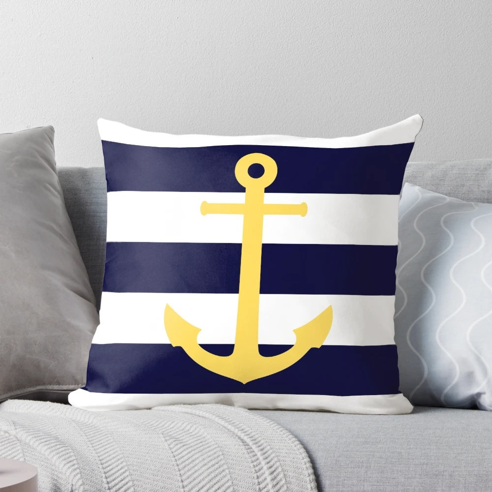 Nautical anchor-patterned pillow in mustard yellow and navy blue stripes
