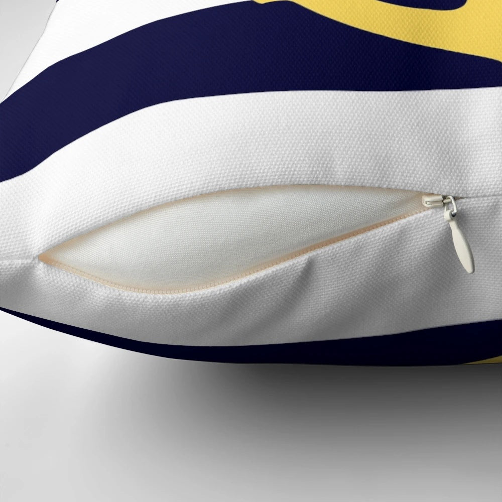 Nautical anchor-patterned pillow in mustard yellow and navy blue stripes