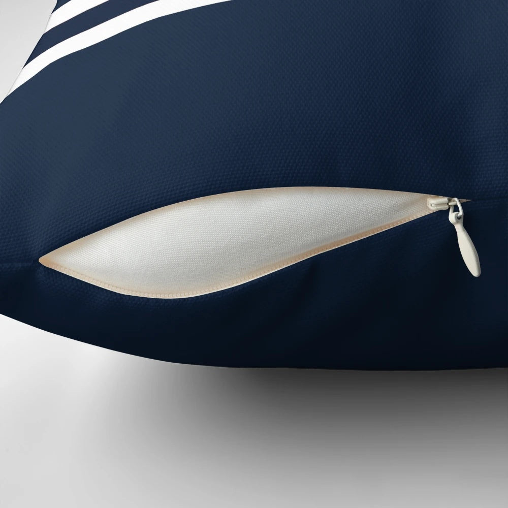 Nautical-themed decorative throw pillow with anchor and blue and white striped pattern