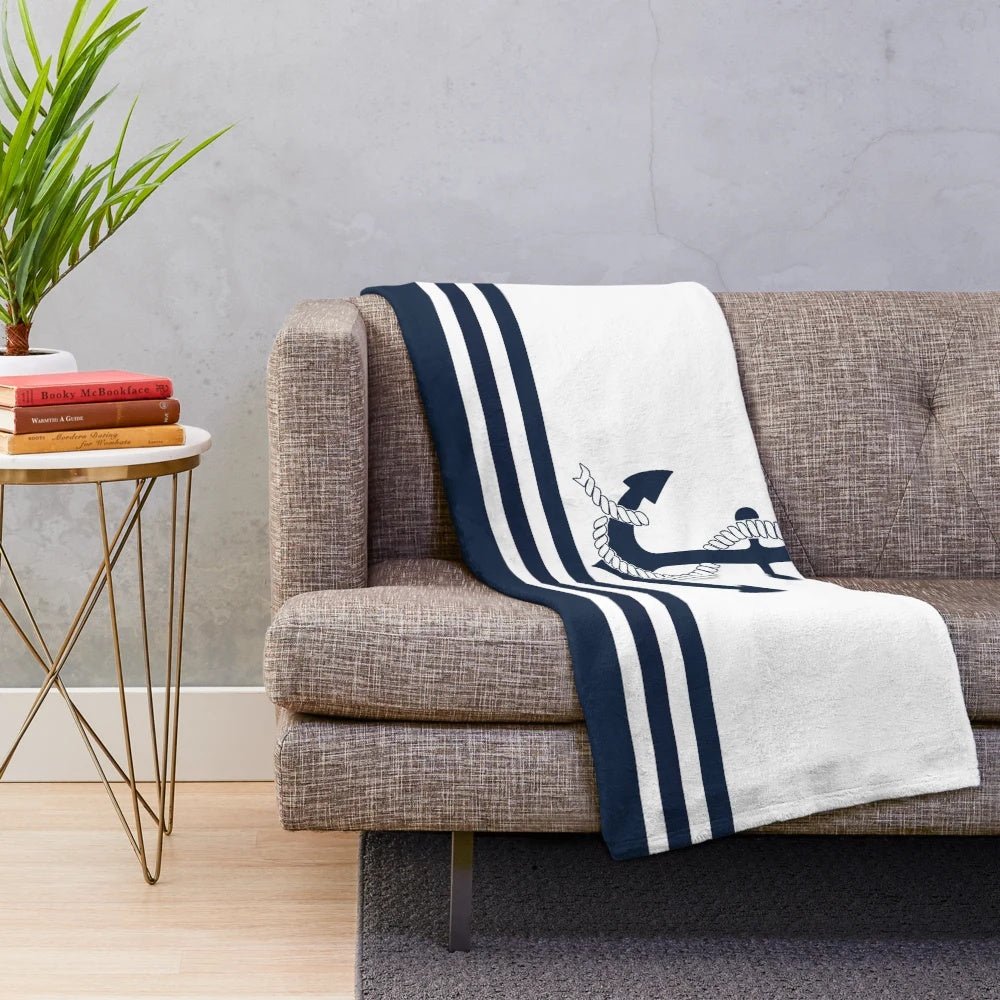 Nautical blue anchor plush blanket with blue and white striped pattern