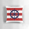 A nautical-themed accent pillow featuring a navy blue and red striped design with a ship's steering wheel in the center.