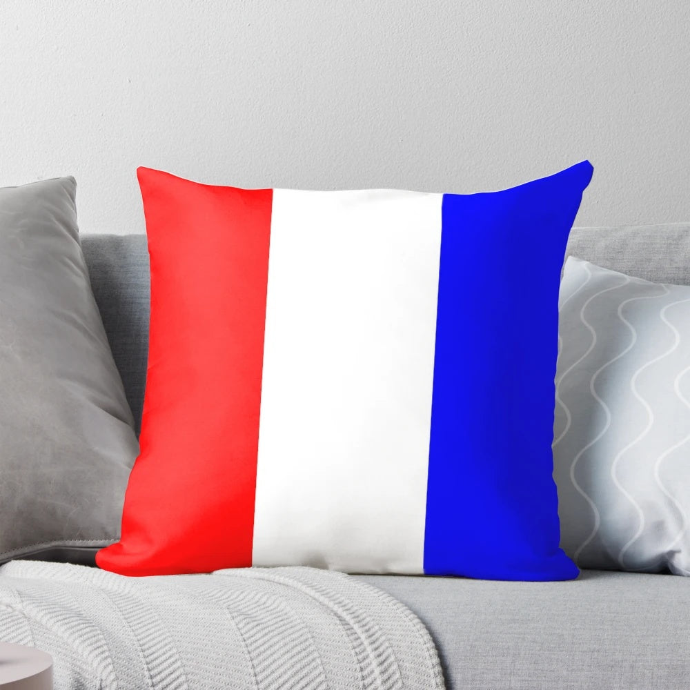 An international maritime signal flags alphabet pillow featuring the letter T, perfect for coastal home decor.