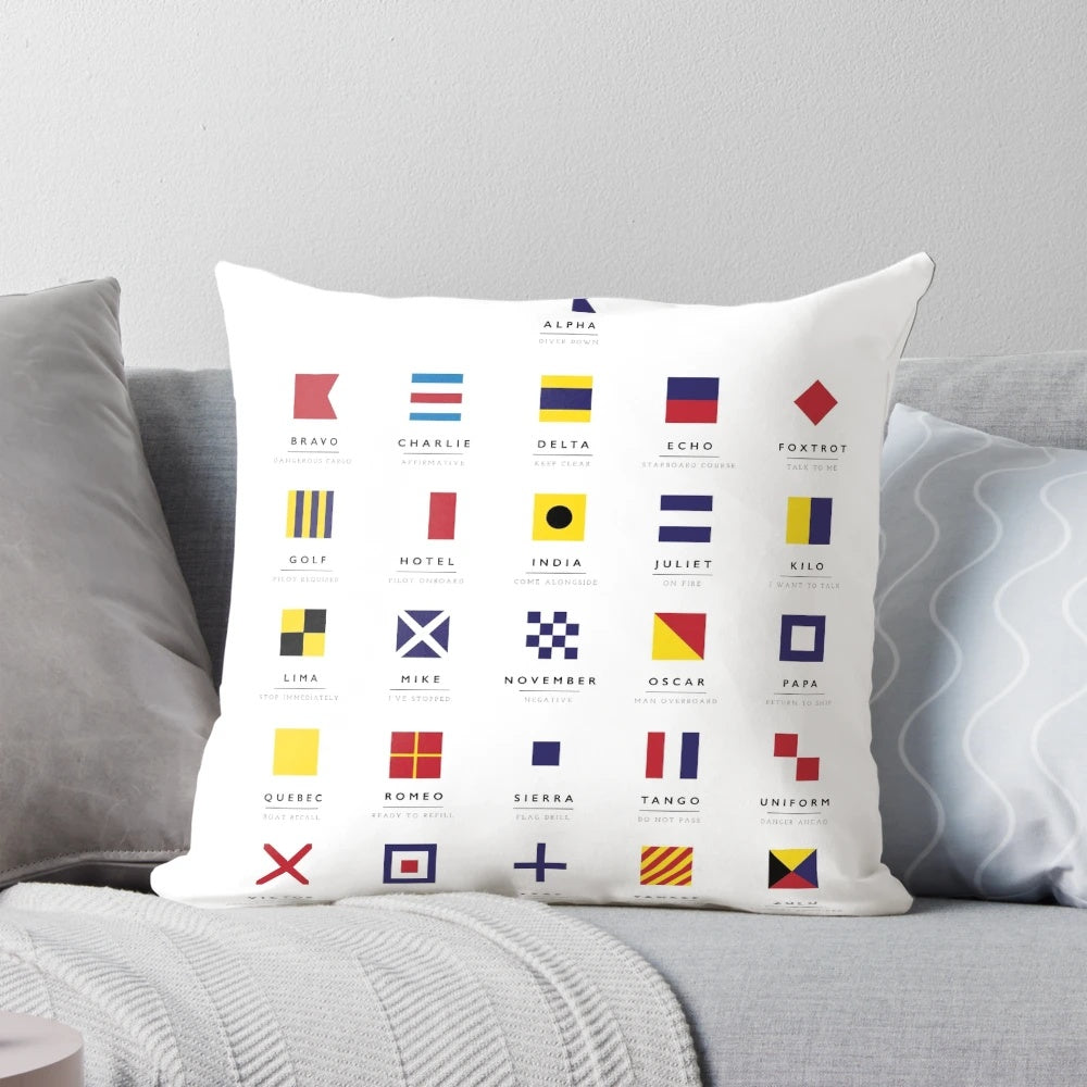 Vibrant nautical flags pillow featuring international maritime signal flags