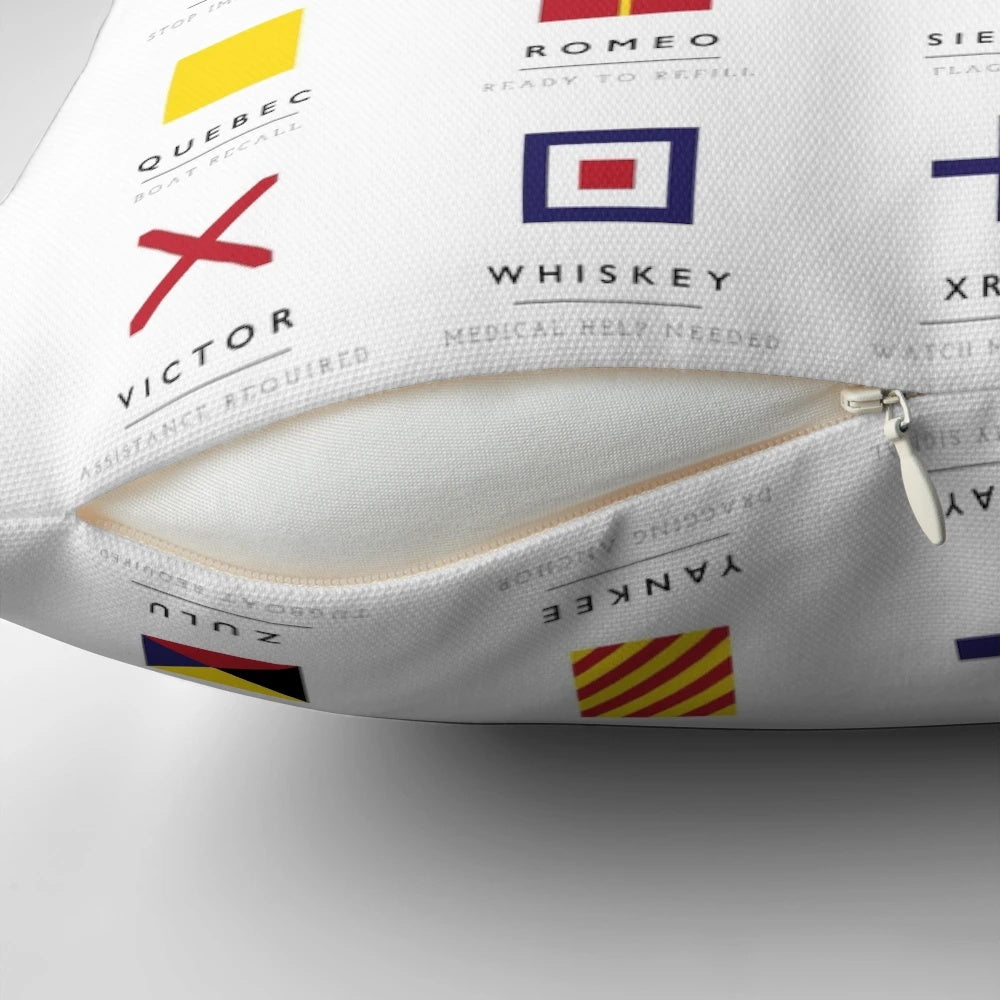 Vibrant nautical flags pillow featuring international maritime signal flags