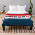 Nautical-themed plush blanket with nautical symbols and striped pattern