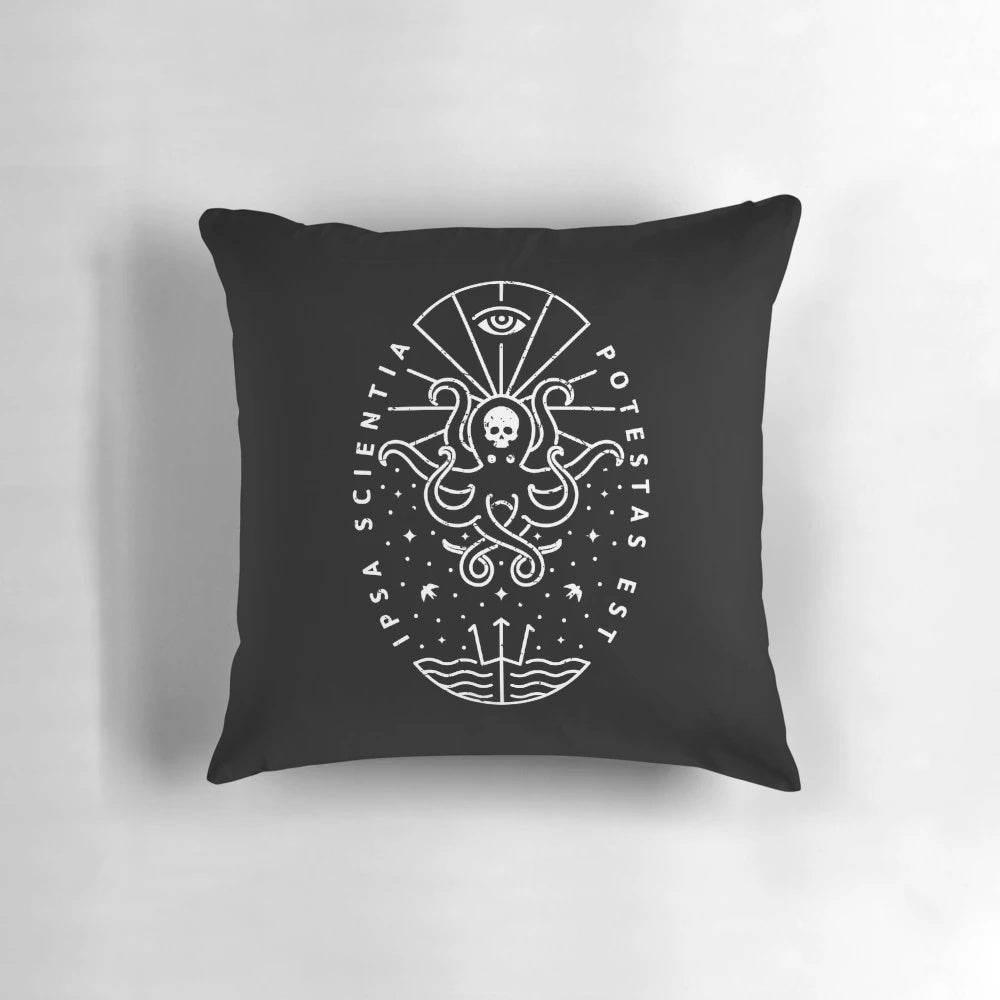 A white pillow with a skull and octopus design, representing the power of knowledge and ancient maritime mythology.