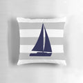 Navy blue and gray striped decorative pillow with a nautical sailboat design