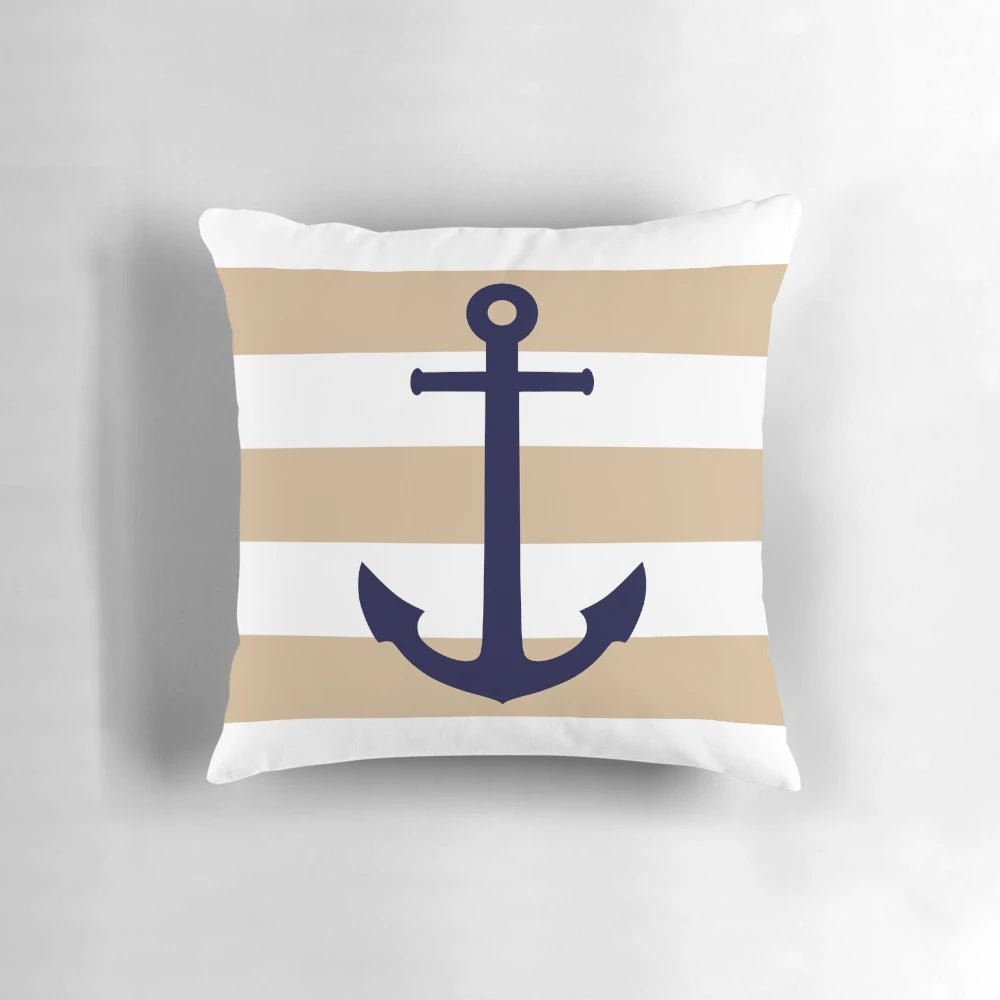 Nautical navy blue and white striped pillow with an anchor design, perfect for coastal home decor
