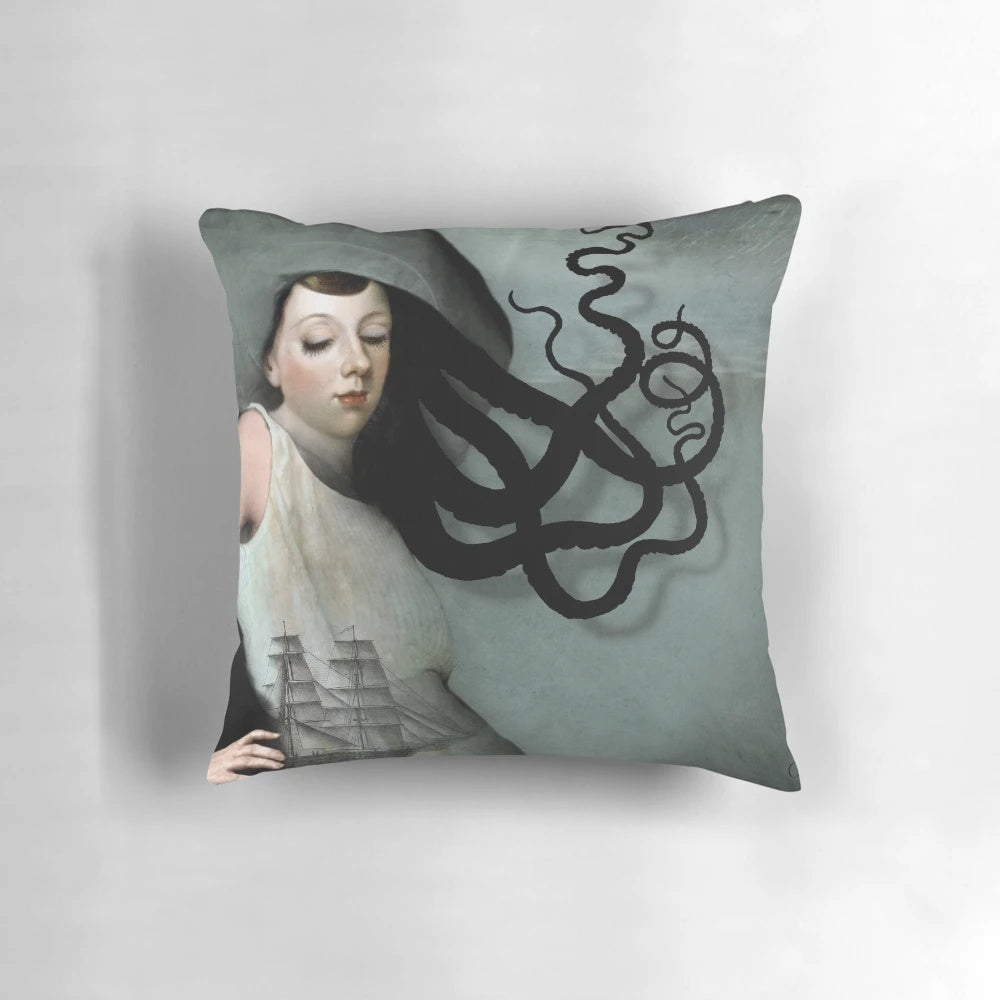 Decorative pillow featuring a girl with a sailing ship design, perfect for nautical and coastal home decor.
