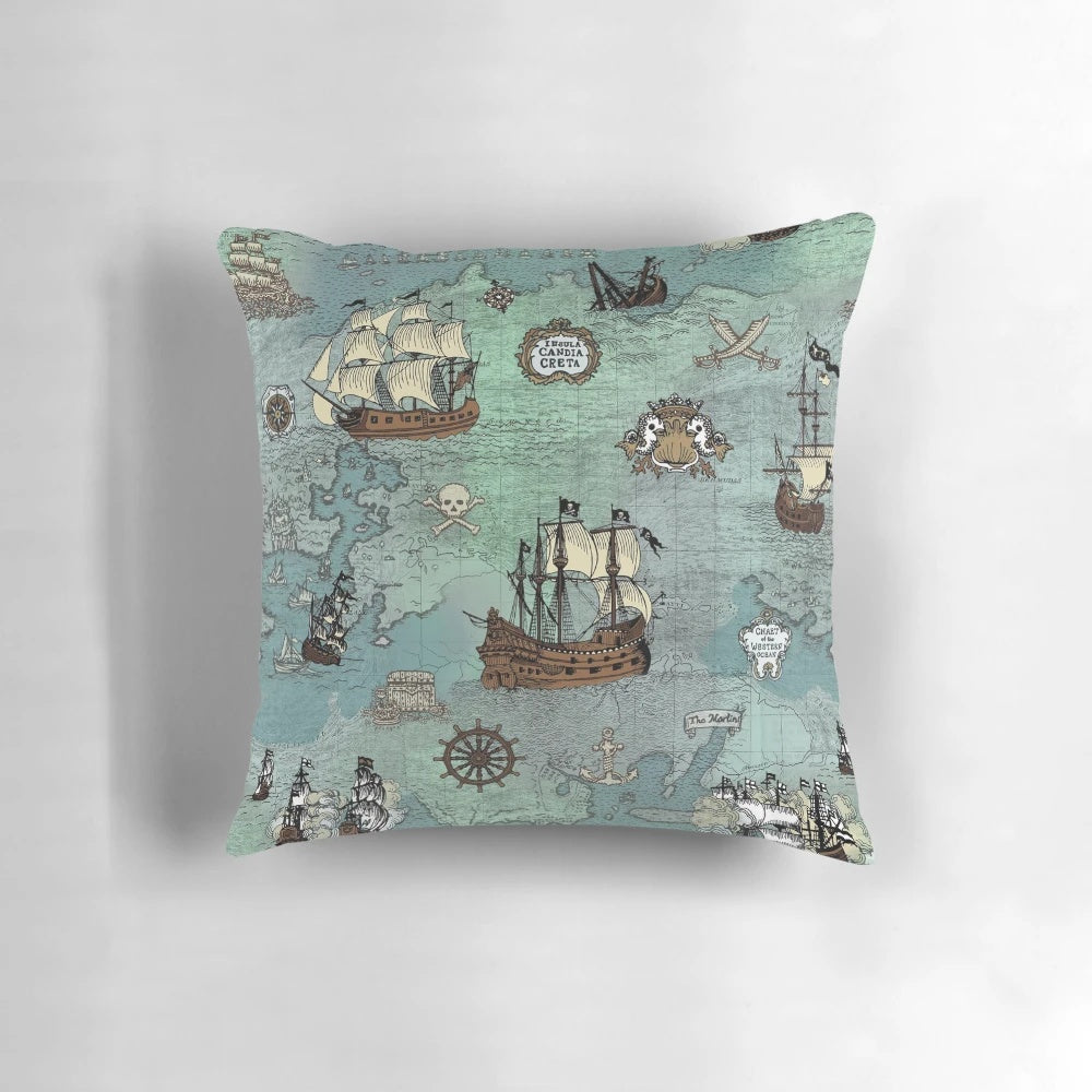 Decorative throw pillow featuring a pirate map print in ocean blue and sea glass green colors.