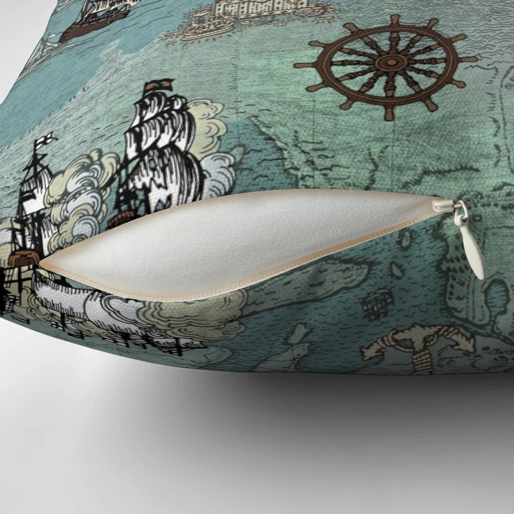 Decorative throw pillow featuring a pirate map print in ocean blue and sea glass green colors.