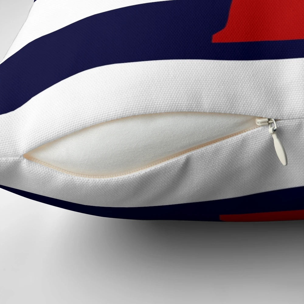 Nautical red lighthouse design on a navy blue and white striped pillow