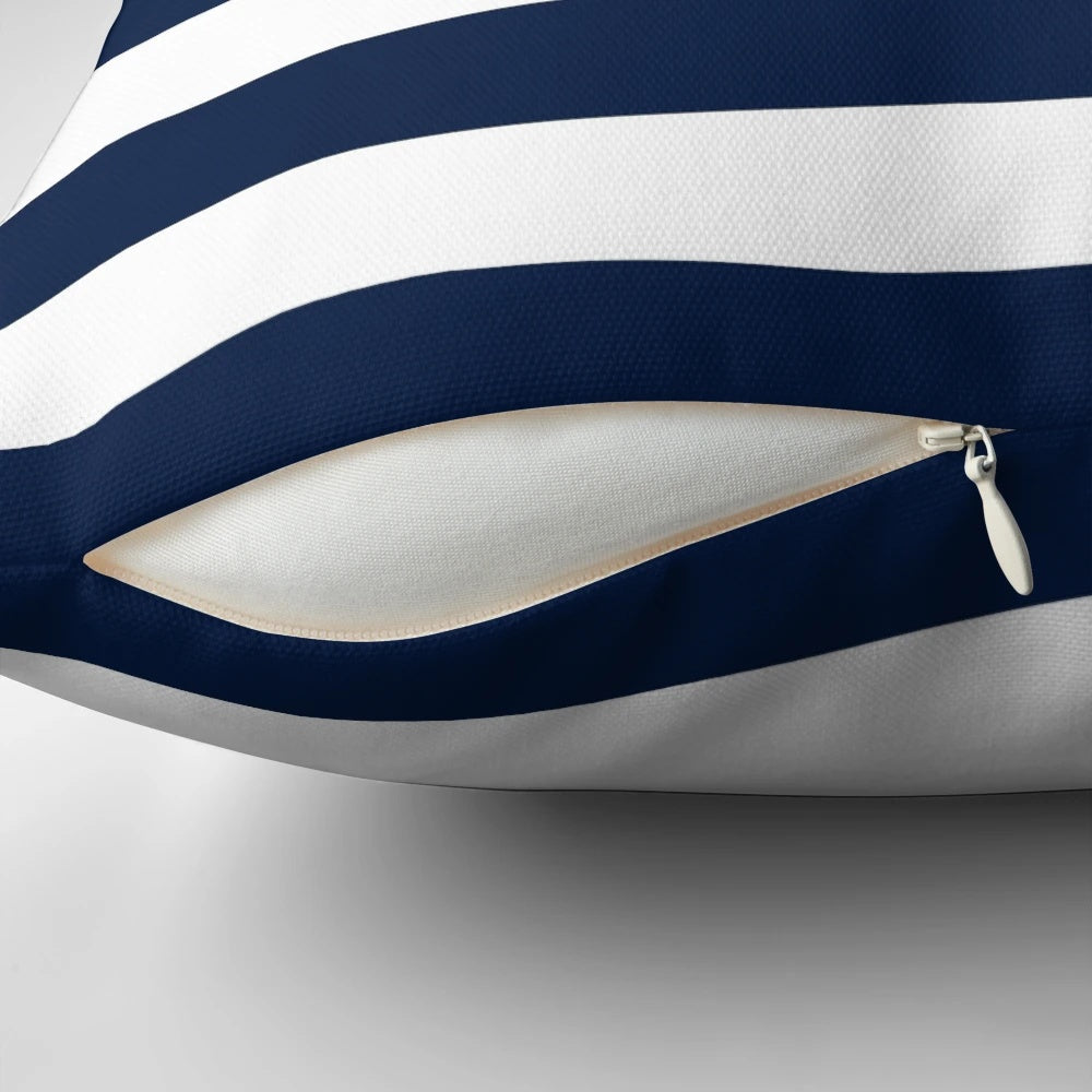 Navy blue and white minimalist striped decorative pillow for coastal, nautical, or beachy home decor.