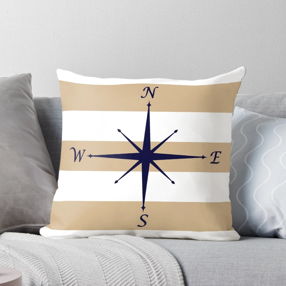 Nautical tropical striped throw pillow with a compass design