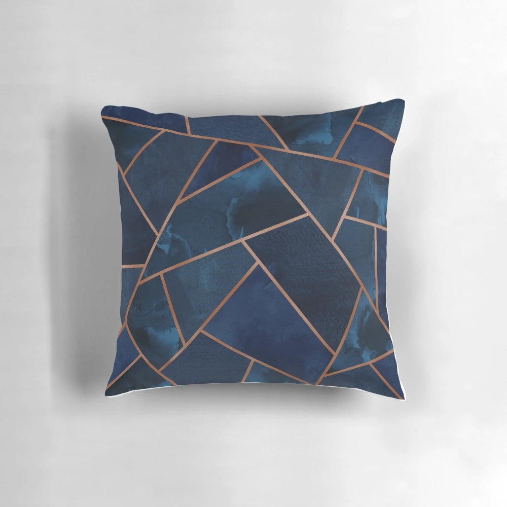 Navy and copper geometric patterned decorative throw pillow