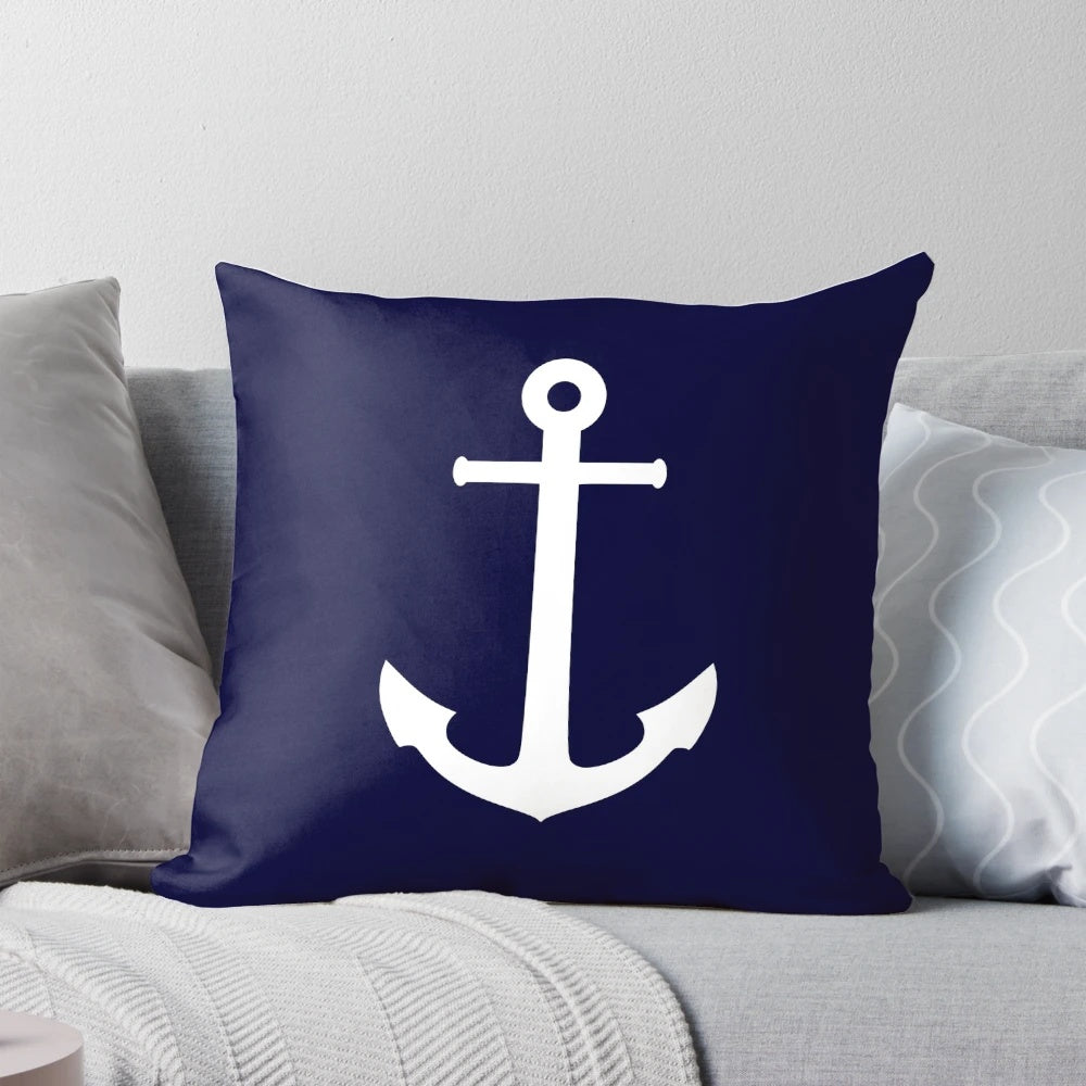 Navy blue throw pillow with white anchor design for coastal home decor