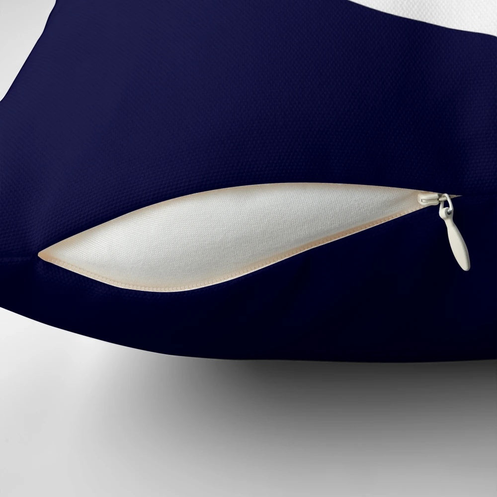 Navy blue throw pillow with white anchor design for coastal home decor